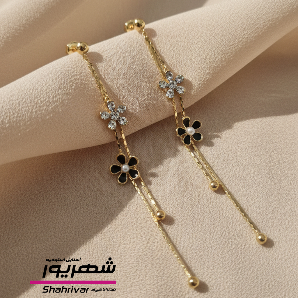 گوشواره میخی طلایی آویز گل میناکاری سیاه و نگین سفید